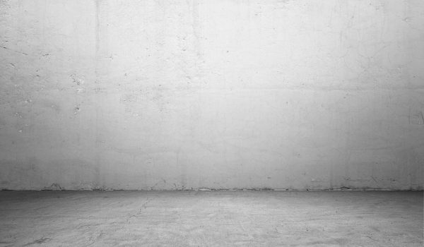 3d rendering of interior with concrete wall and floor. Textured background. Copyspace. Rough-surfaced.